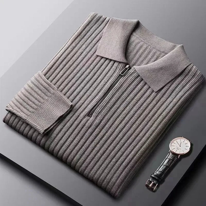 Menswear model wearing a comfortable and stylish ribbed zip-neck sweater for cold weather.