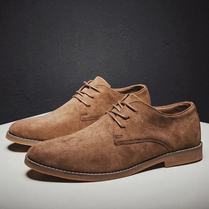 Men's Sebastian suede oxford dress shoes, perfect for formal and business attire. Elegant lace-up footwear.