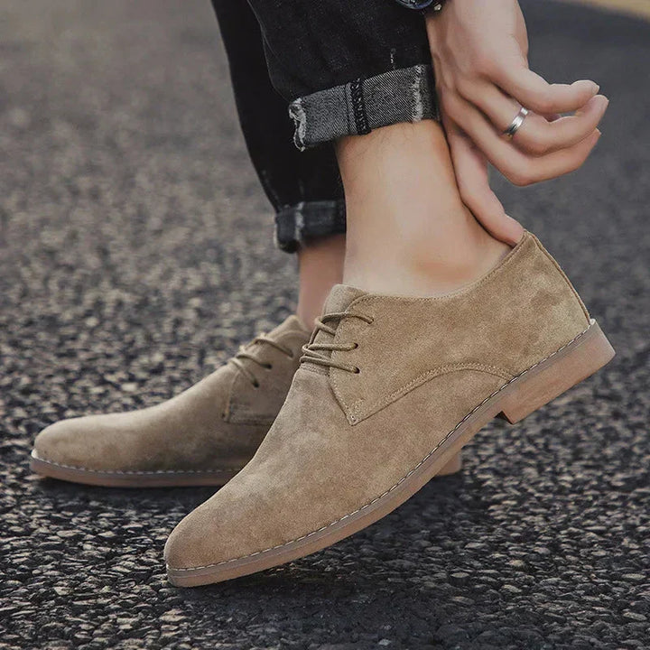 Elegant men's brown suede oxford shoes. Perfect formal or business attire footwear for a smart look.