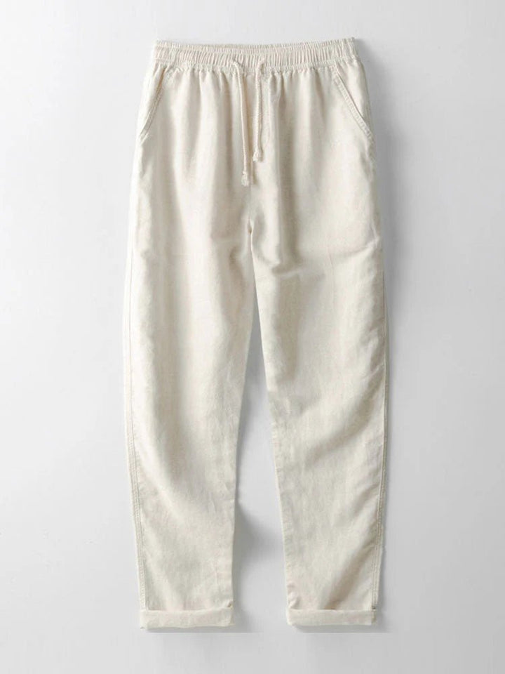 Men's stylish two-piece set: casual shirt and trousers with rolled cuffs, great for summer fashion.