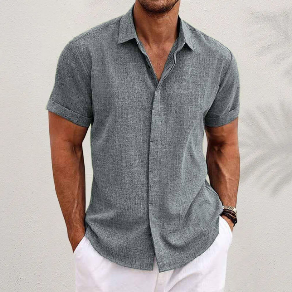 Stylish men's short sleeve summer shirt with a relaxed fit, ideal for warm weather fashion.