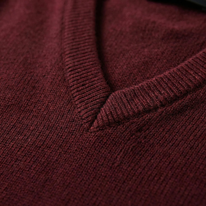 Close-up of men's sleeveless V-neck vest, highlighting the knit texture and modern cut.