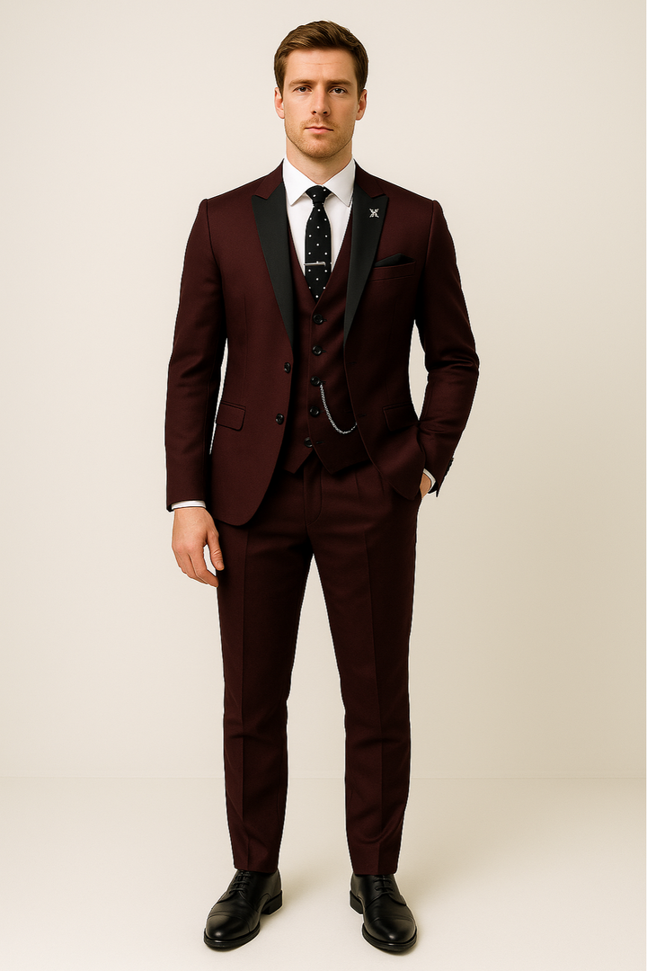 Elegant men's burgundy three-piece suit with jacket, vest, and trousers. Slim-fit formal eveningwear.