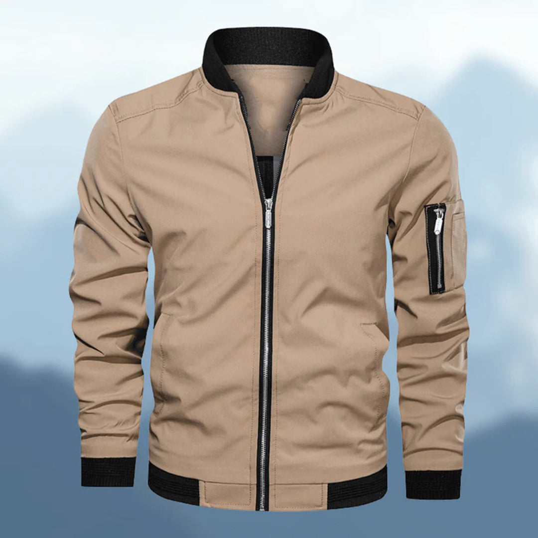 Close-up of a men's slim fit casual bomber jacket in grey, showing fabric detail, lightweight.