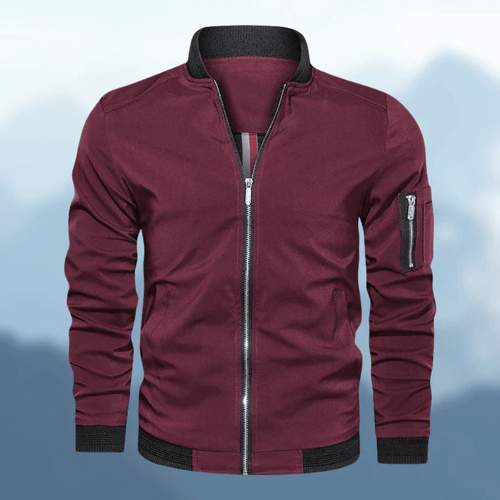 Model wearing a men's slim fit black bomber jacket, a versatile and trendy casual outerwear piece.
