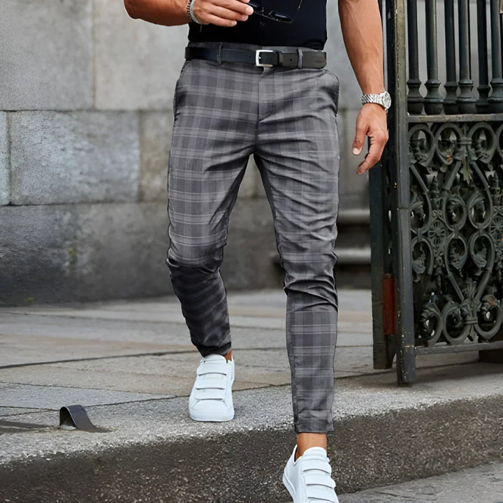Sophisticated men's slim fit checked dress pants, cropped length, offering modern style & comfort.