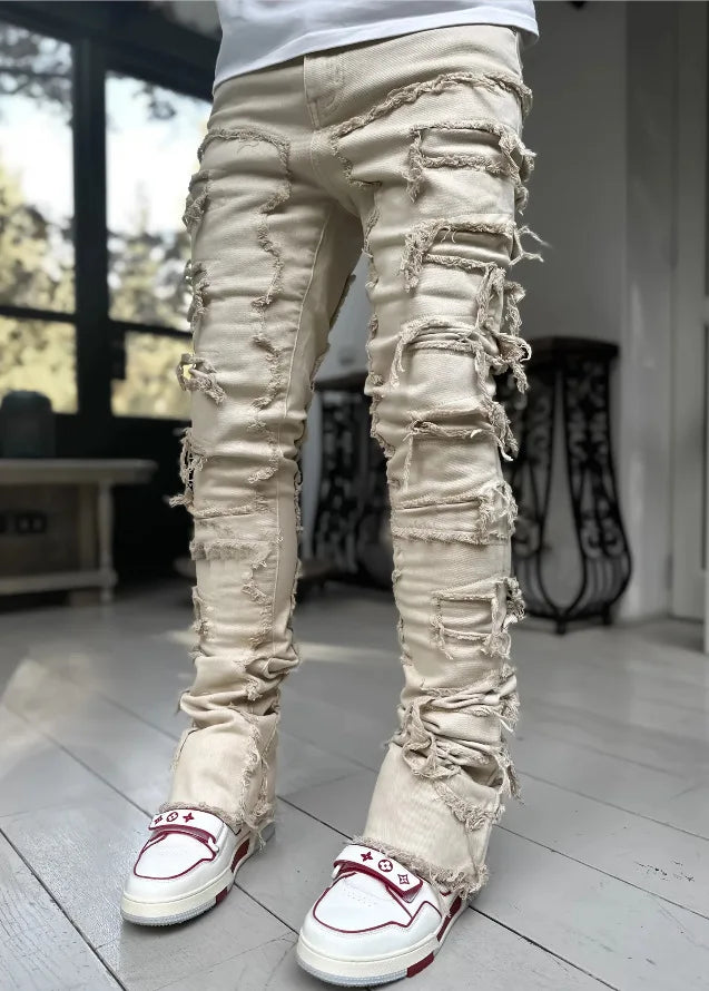 Modern men's slim fit ripped blue jeans. Distressed denim for an edgy, urban fashion & versatile casual look.