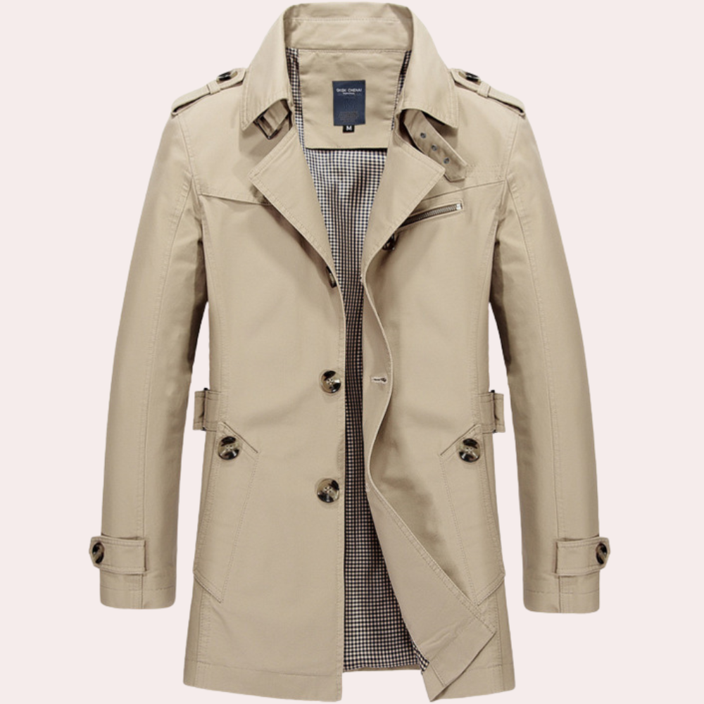 Close-up of the double-breasted detail on a sleek men's slim fit trench coat, winter fashion.