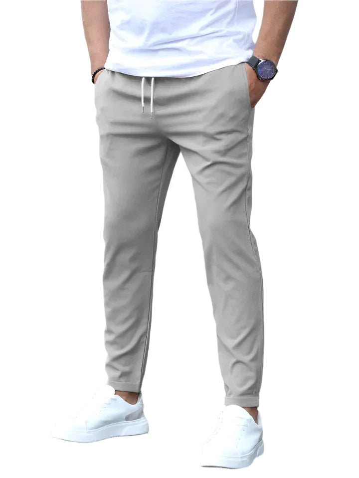 Comfortable men's flexible chino pants, slim fit with drawstring for work or weekend.