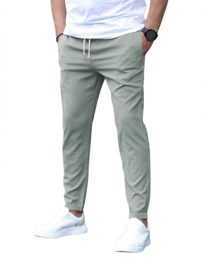 Sleek men's slim fit drawstring chino pants, perfect for versatile everyday fashion.