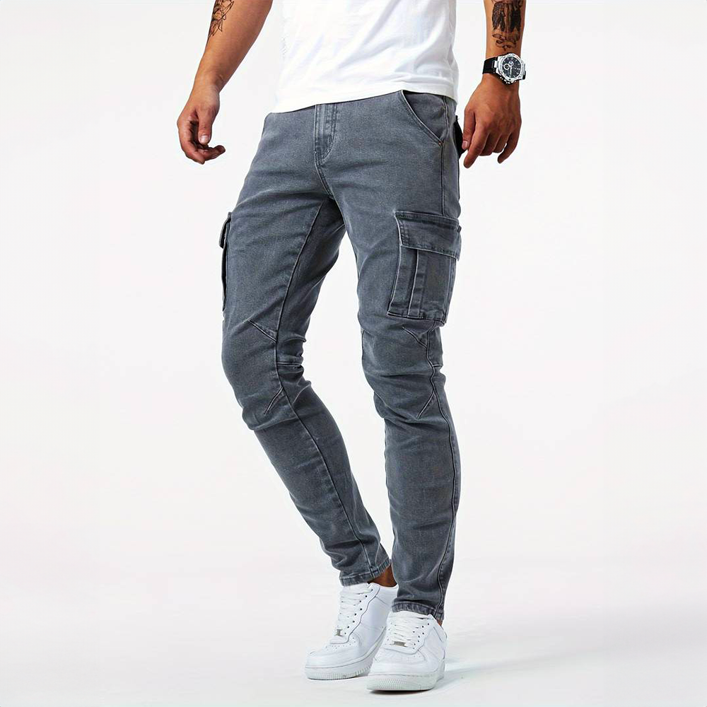 Men's slim fit gray cargo pants with stylish side flap pockets for modern everyday wear.