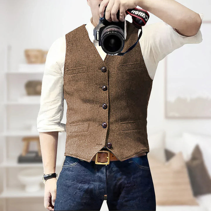 Tailored men's slim fit herringbone tweed vest, ideal for wedding attire.