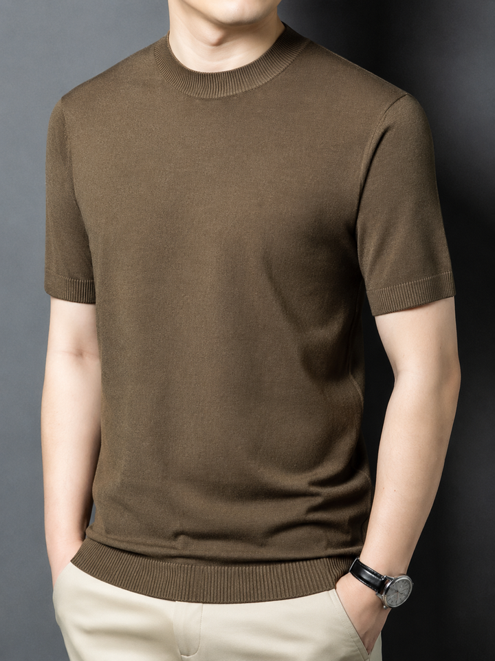 Front view: Men's slim fit short sleeve mock neck casual t-shirt, sleek look.