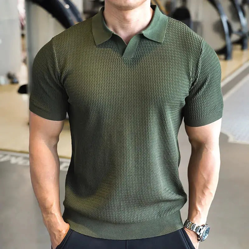 Stylish men's textured slim fit polo shirt, featuring short sleeves and a classic collar for a modern casual look.