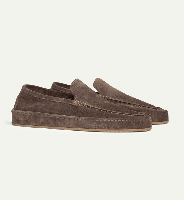 Comfortable men's slip-on loafers with cushioning for all-day versatile wear.