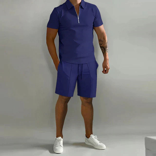 Men's casual two-piece summer outfit featuring a zippered polo shirt and breathable drawstring shorts for relaxation.
