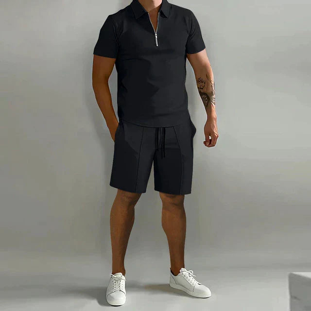 Breathable & comfortable men's two-piece summer outfit with a zippered polo and drawstring shorts, ideal for heat.