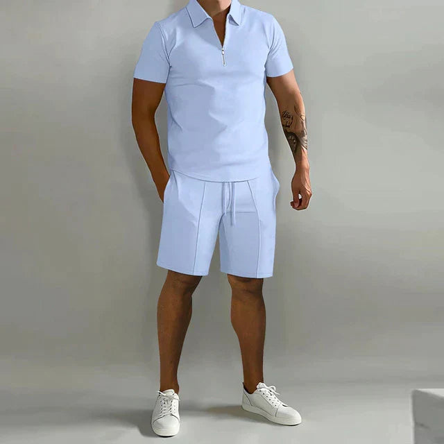 Stylish men's two-piece summer set with a casual zippered polo and comfortable drawstring shorts, great for holidays.