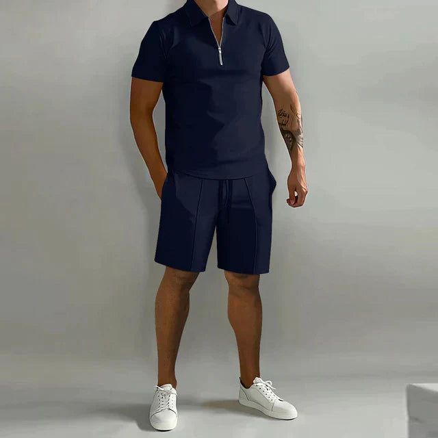 Men's two-piece summer vacation outfit: a comfortable, breathable polo and matching drawstring shorts for sunny days.