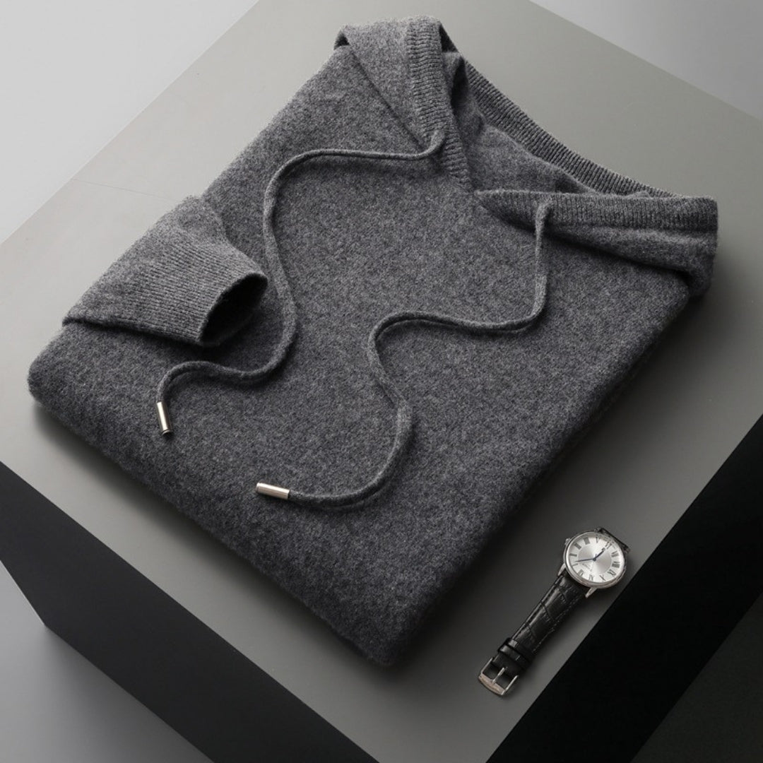 Close-up of the soft knit texture on a men's hooded pullover, highlighting quality and comfort