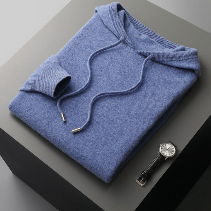 Man wearing a stylish and comfortable men's soft knit hooded pullover, suitable for spring outings