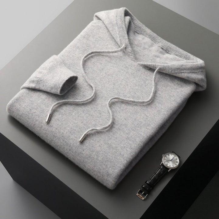 Side profile of a comfortable men's long sleeve knitwear hoodie, great for a relaxed spring look