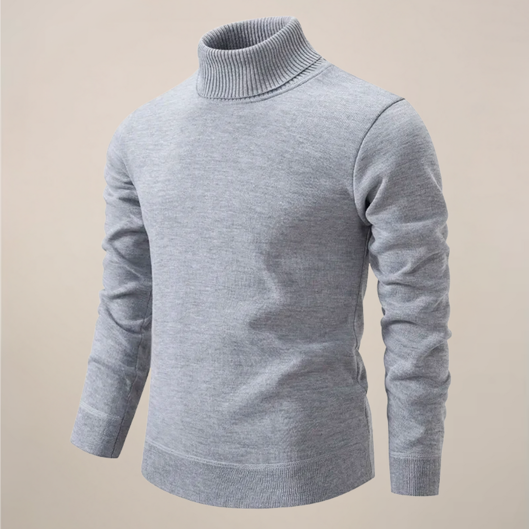 Detail of men's solid turtleneck sweater fabric, showcasing its comfortable and minimalist design.