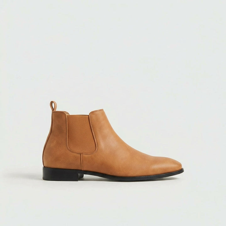 Men's Stratton Chelsea dress boots, an elegant choice for sophisticated formal and business casual outfits.