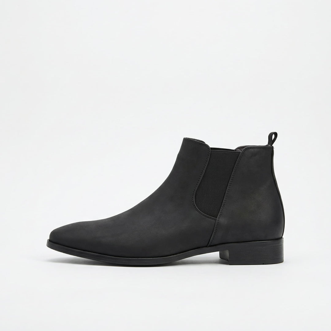 Stylish black men's Stratton Chelsea boots, perfect for casual or sophisticated dress outfits.