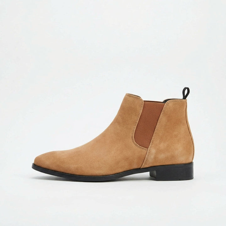 Close-up texture of men's Stratton Chelsea boots, revealing premium material and craftsmanship.