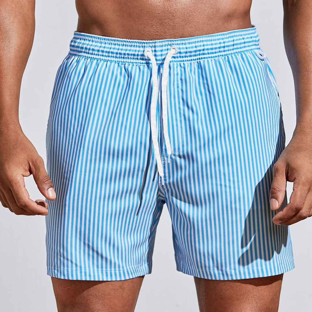 Classic men's striped beach shorts, essential for pool activities and casual summer wear.