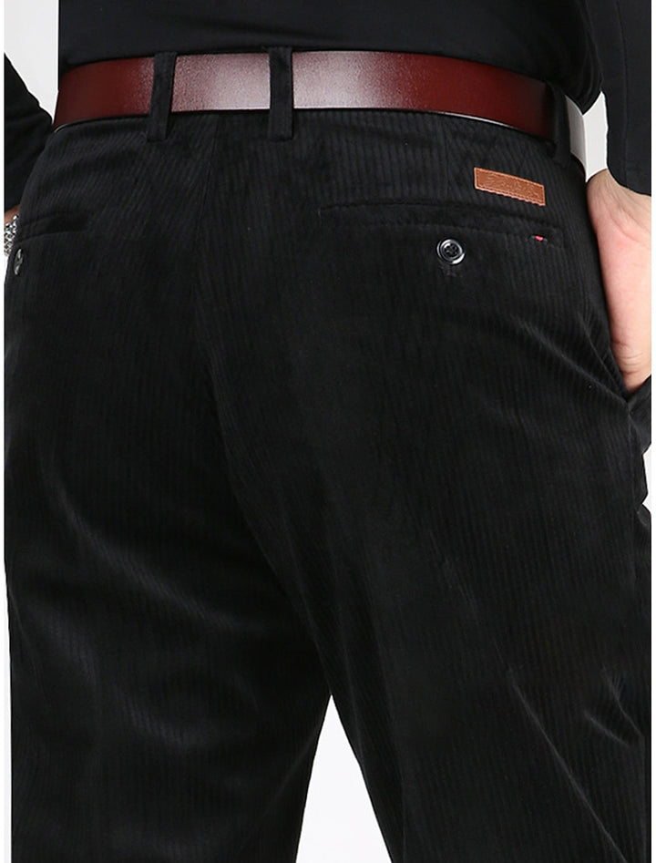 Men's structured ribbed pants in a dark color, perfect for an elevated casual look and everyday wear.