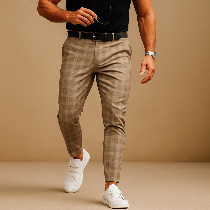 Modern black and white checkered trousers for men, suitable for office wear or a sophisticated casual look.