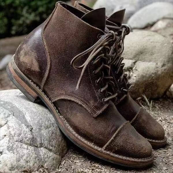 Men's stylish brown leather lace-up winter boots with dark laces, ideal for cold weather outfit