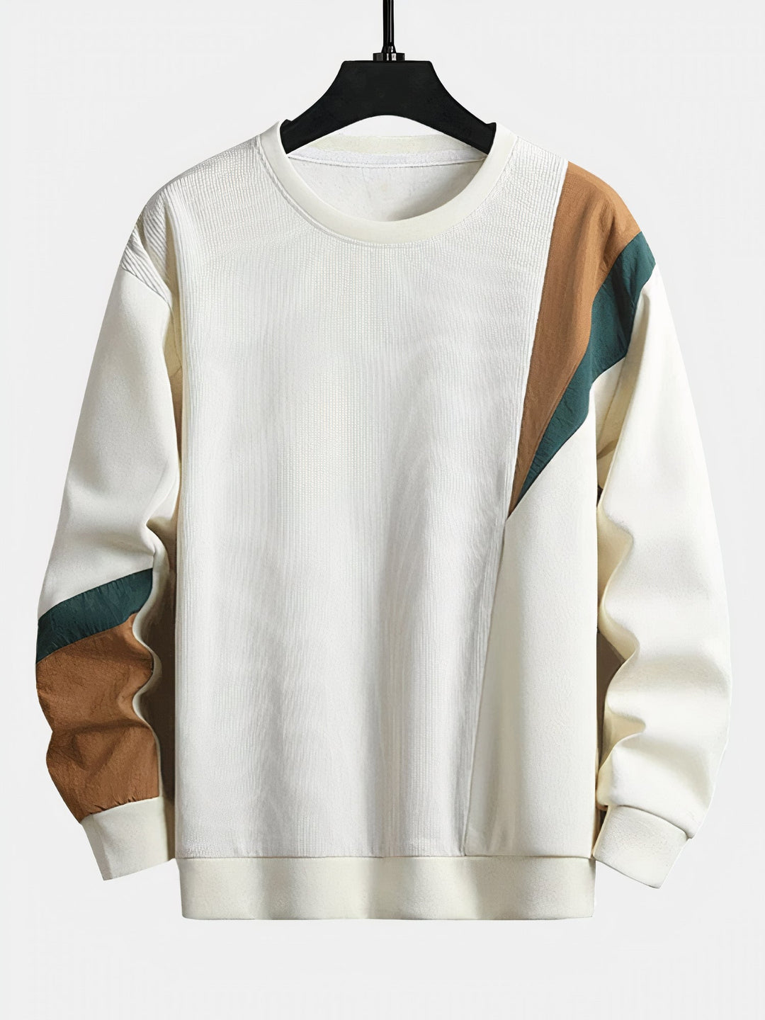 Modern men's color-block sweater for a versatile fall outfit. Stylish knitwear, perfect for cool weather.