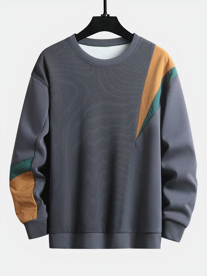 Comfortable men's color-block pullover, a stylish long-sleeve knit sweater for casual modern autumn fashion.