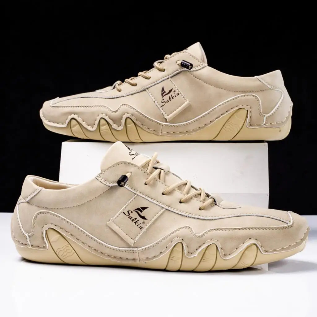 Modern men's lace-up casual footwear, featuring durable paneled design.