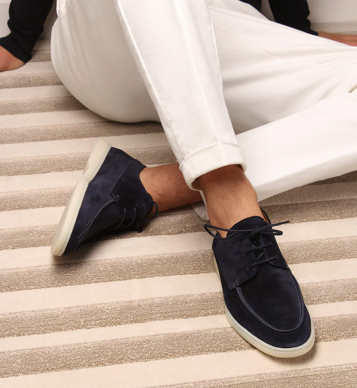 Men's stylish lace-up loafers, perfect for everyday comfort. Features a classic moc-toe design for casual wear.