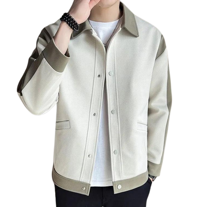 Men's long-sleeve patchwork jacket with lapel collar & snap buttons. Fashionable casual outerwear.