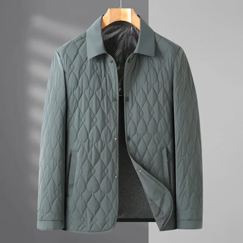 Warm men's collared quilted jacket with button-down closure, suitable for stylish winter outfits.