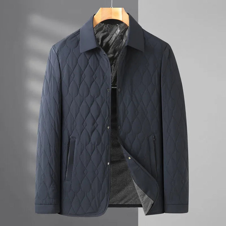 Everyday men's quilted jacket with classic button-down front, offering stylish warmth for fall.