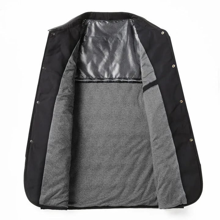Durable men's quilted jacket featuring button closure and collared design, essential for fall/winter.