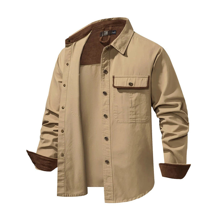 Man wearing a stylish men's shirt with contrasting details, ideal for modern men's casual or formal fashion.