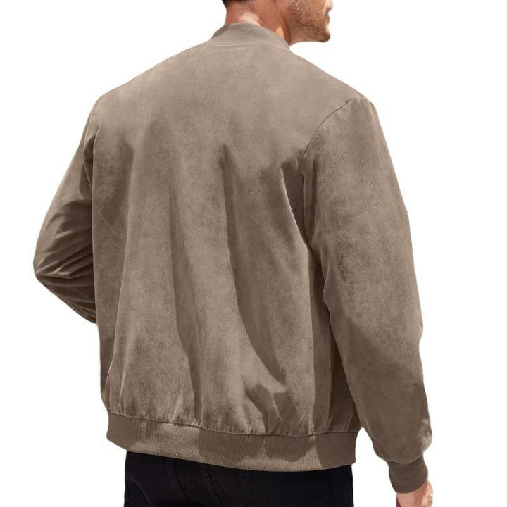 Man in a stylish suede-look transitional jacket, perfect for urban spring fashion.