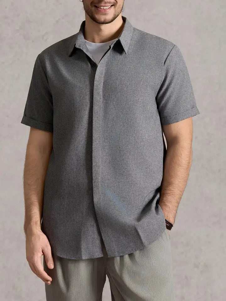 Versatile men's textured short sleeve shirt, button down, ideal for various summer outfits.