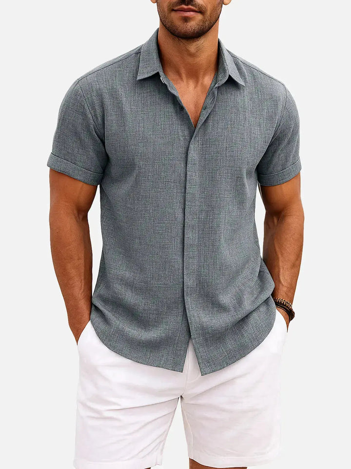 Men's summer fashion: textured short sleeve button down casual shirt for a modern look.