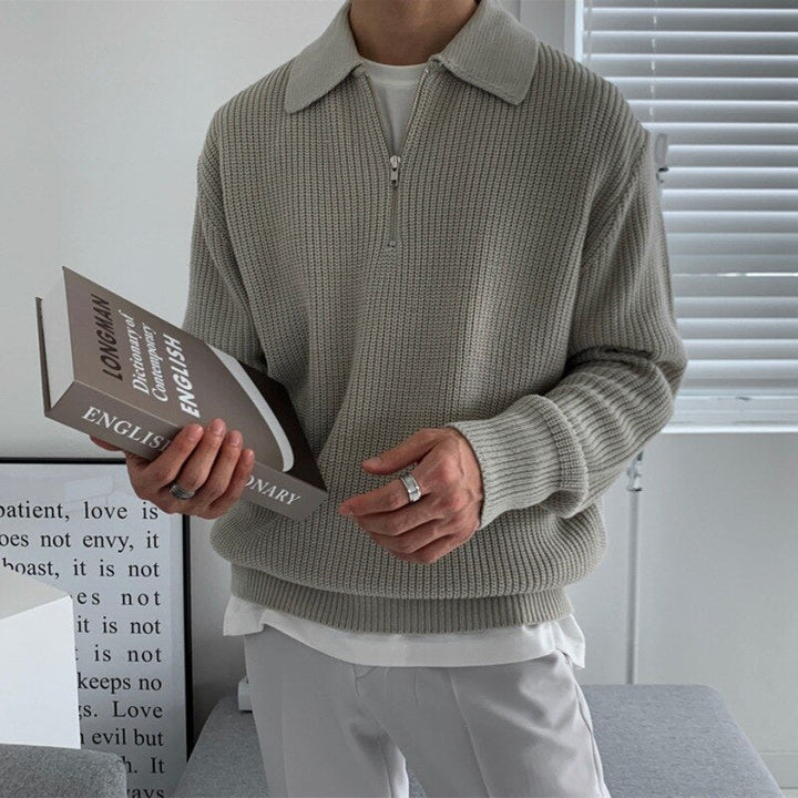 Stylish men's zip collar sweatshirt, a versatile long sleeve top for any casual outfit.