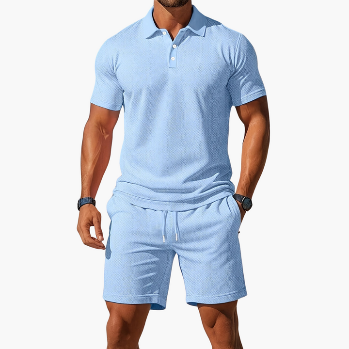 Men's summer polo shirt & drawstring shorts lounge set. Casual 2-piece outfit for warm weather comfort.