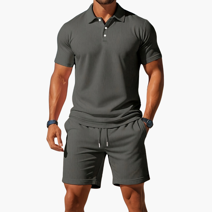 Relaxed fit men's 2-piece summer set: short sleeve polo & drawstring shorts. Ultimate comfort wear.