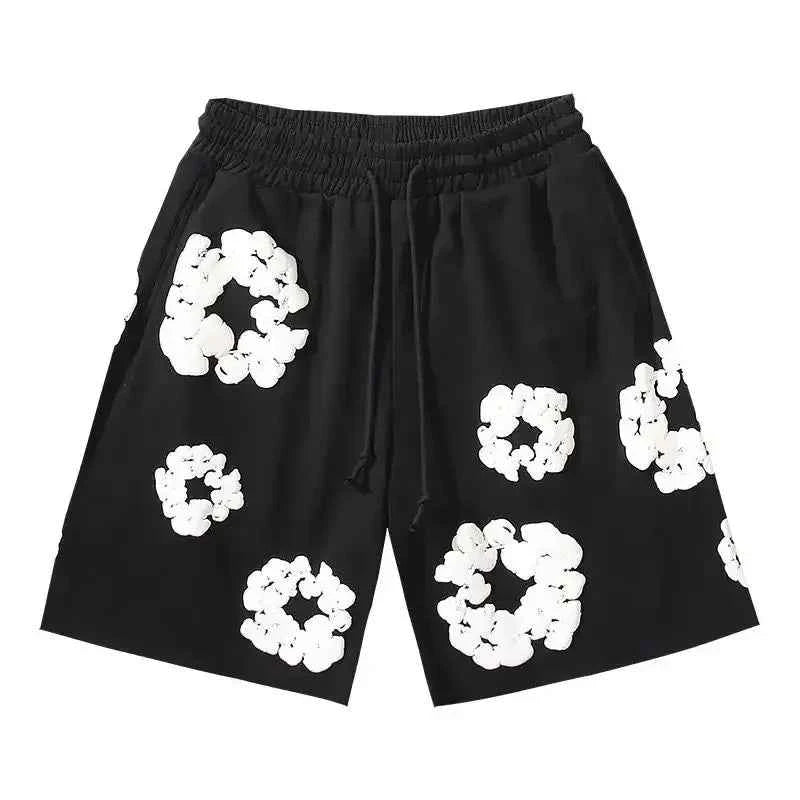 Relaxed fit men's casual shorts with a bold floral print for summer fashion.